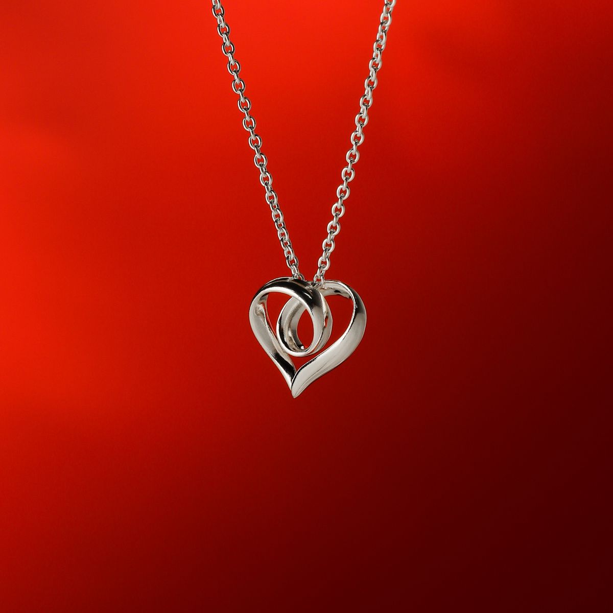 Sterling Silver Infinite Loop Heart Necklace