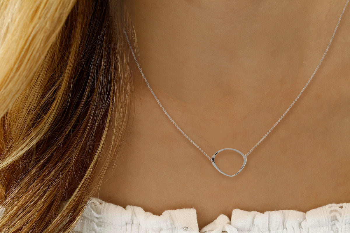 Sterling Silver Freeform Circle Necklace 16 to 18 inch Adjustable by Carla & Nancy B.