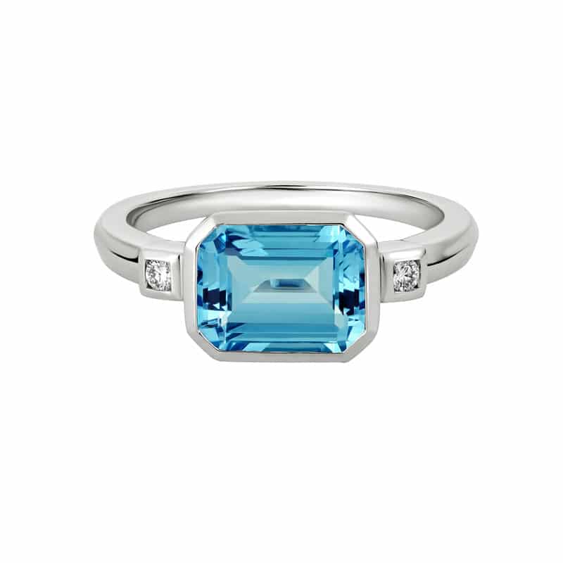 14K White Gold Emerald Cut Blue Topaz Ring with Diamonds by The Little Jewel