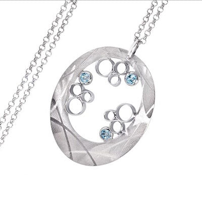 Sterling Silver Brushed Blue Topaz Circle Necklace by Frederic Duclos