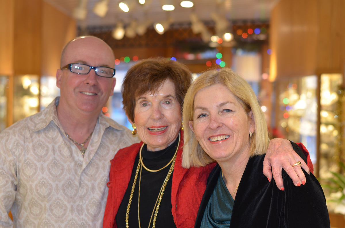 The family together inside The Little Jewel decorated for the holidays